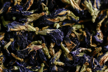 Tibetan Anchan tea on a dark background close-up. Blue tea