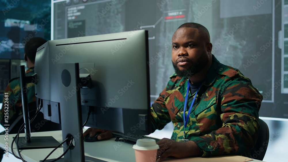 Poster army professionals in command post overseeing satellite data and real time surveillance, mission int