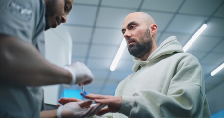 Airport Terminal: African American Security Officer Conducts TSA Hand Swab Screening with Brush to...