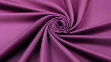 Obraz premium A deep magenta fabric with elegant folds and dramatic lighting contrasts