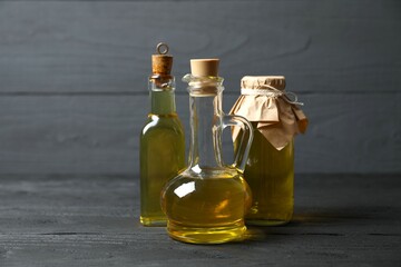 Bottles of fresh oil on the table 