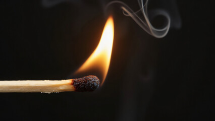 A macro shot of a burning matchstick with a bright, detailed flame and a thin trail of smoke curling into the air
