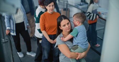 Security Checkpoint in Airport Terminal: Queue of Diverse People, Tourists Standing for Metal...