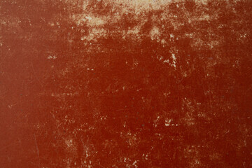 Surface of worn red-brown old cardboard sheet.