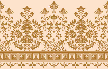 A gold and white border with floral designs