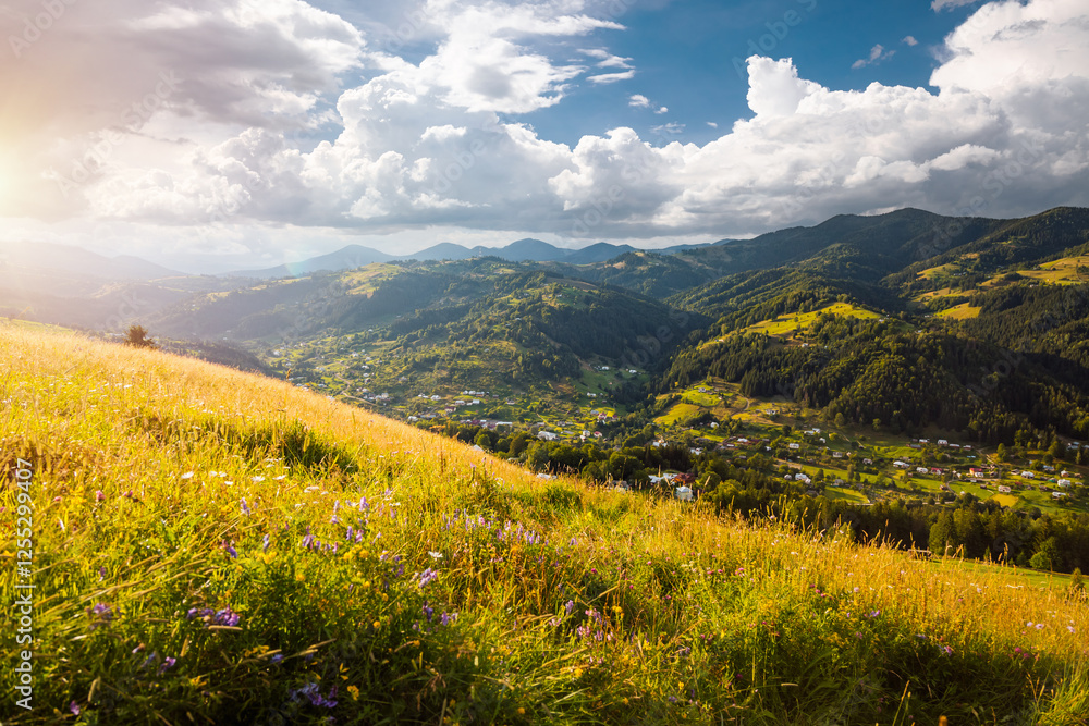 Aufkleber a splendid rustic scene with green rolling hills and distant huts illuminated by sunlight. carpathia