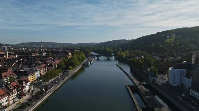 Aerial drone view of the Main River featuring Ludwigsbr&uuml;cke in W&uuml;rzburg, Germany.