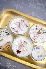 candles on a gold tray. Handmade candles