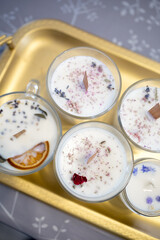 candles on a gold tray. Handmade candles