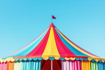 Colorful circus tent with bright stripes against a clear blue sky