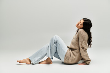 Celebrating beauty and confidence of plus size woman in studio setting