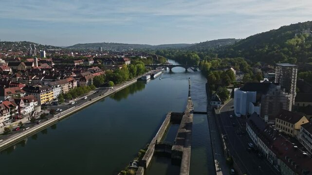 Aerial drone view of the Main River featuring Ludwigsbr&uuml;cke in W&uuml;rzburg, Germany.
