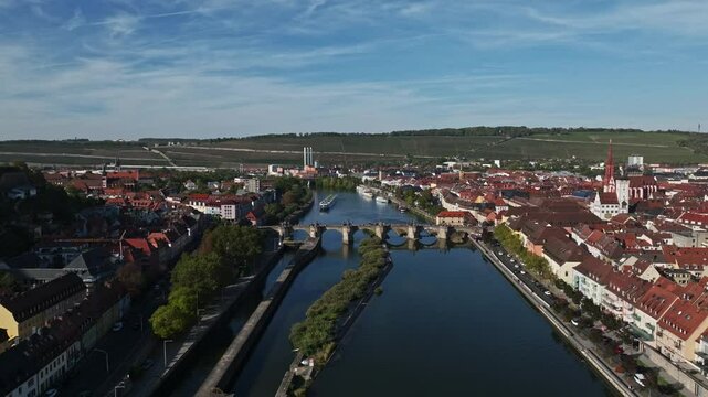 Aerial drone view of the Main River featuring the historic Old Main Bridge (Alte Mainbr&uuml;cke) in W&uuml;rzburg, Germany. 