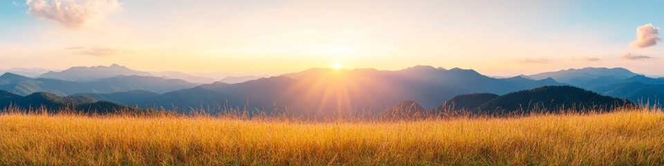 Panoramic Mountain Landscape Golden Grass and Misty Peaks at Sunset - Sustainable Travel Visuals and Scenic for Outdoor Adventure Campaigns