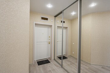 standard room interior apartment. room doors, renovation corridor lobby entrance hall