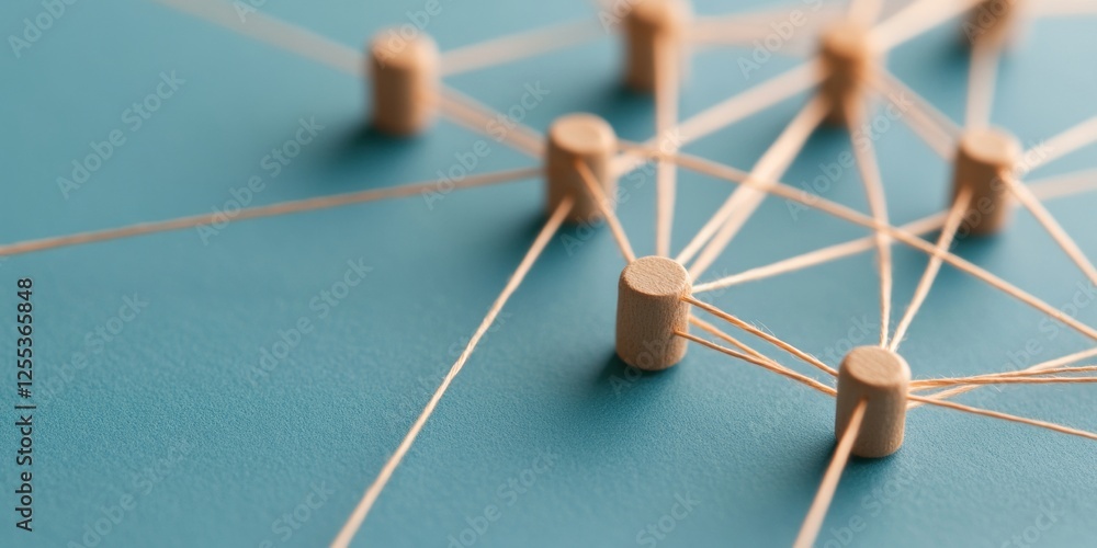 Fototapete Minimalist Network Diagram Art Wooden Nodes with String on Blue Surface - Innovative Systems Thinking for Tech and Business Solutions, Visualizing Interconnected Efficiency
