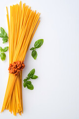 Top view raw spaghetti isolated on white background
