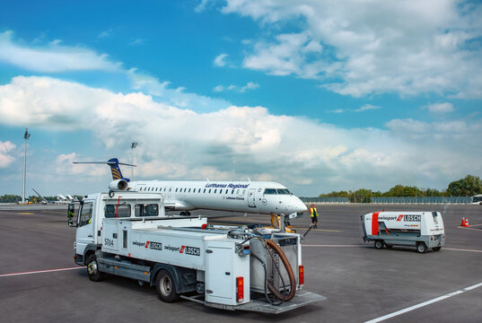 Loading of the Lufthansa aircraft jet at the Munich airport in summer: Munich, Germany - September 15, 2018