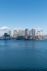 Fototapeta premium Tokyo Skyline under the blue sky on a sunny day