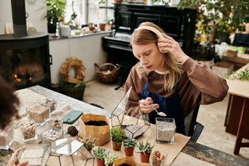 Creative moments at a succulent workshop with friends surrounded by vibrant plants
