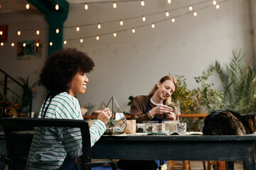 Creating vibrant plant arrangements at a joyful workshop with friends