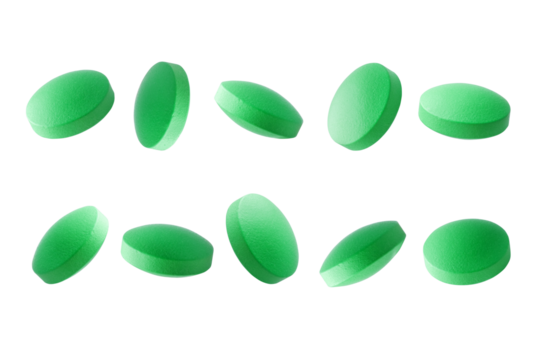 Set of green pills close up on a transparent background