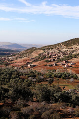 View over rocky mountains, road to Atlas Mountains near Marrakech, travel in Morocco.