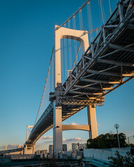 Fototapeta premium Rainbow bridge in Tokyo and a close up to its structure 