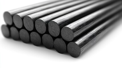 Stacked black metal rods on white background
