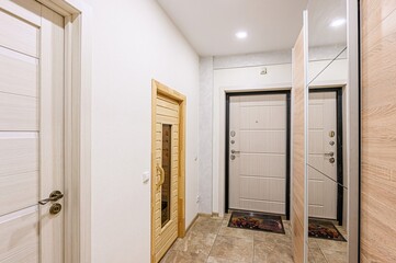 standard room interior apartment. room doors, renovation corridor lobby entrance hall