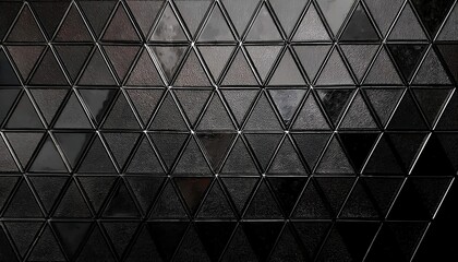 black triangular tile texture with geometric pattern for modern wall design and industrial minimalist background