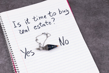Magic Pendulum swinging between Yes and No over the question Is it time to buy real estate? Concept of irrational business decisions, mysticism, humorous critique of modern financial planning.