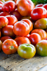 A selection of fresh Italian tomatoes displayed at the fruit market