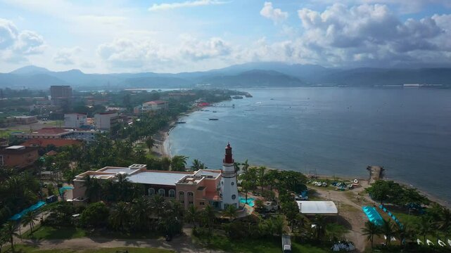 A stunning aerial view reveals the vast Subic ocean, where the deep blue waters stretch toward the horizon under the open sky.