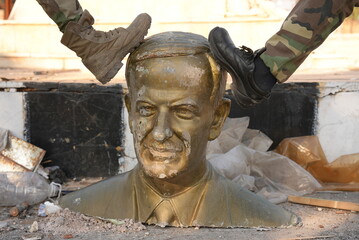 Demolition of Hafez al-Assad's statue, the fall of Bashar al-Assad's regime. 