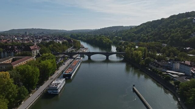 Aerial drone view of the Main River featuring Ludwigsbr&uuml;cke in W&uuml;rzburg, Germany.