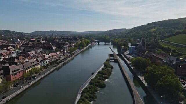 Aerial drone view of the Main River featuring Ludwigsbr&uuml;cke in W&uuml;rzburg, Germany.