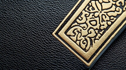 Ornate Gold Detail on Black Leather Book Cover