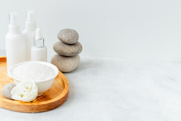 Set of cosmetic products on tray on the bathroom table