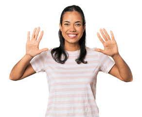 Young Filipina woman showing number ten with hands.