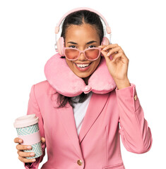 Young Filipina with chic travel accessories in pink tones