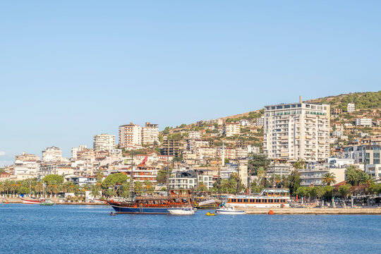 City view of Saranda, Albania with harbor and buildings along the coastline