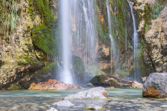 Scenic view of Theti waterfall in Theth, Albania with moss-covered rocks