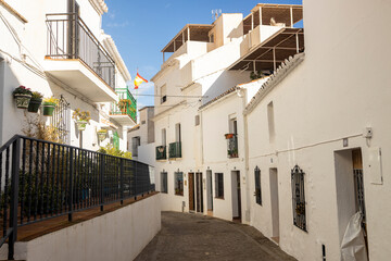 Curved small street in white washed town Mediterranean town on the Costa del Sol Mijas in Andalusian region of Spain