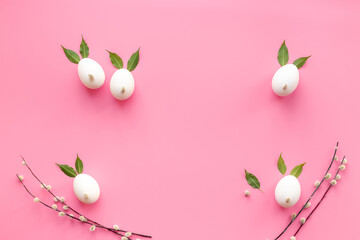 Frame of Easter bunny made of eggs and willow buds. Happy Easter concept