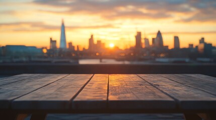 London skyline at vibrant sunset, seen from wooden table top on rooftop terrace view