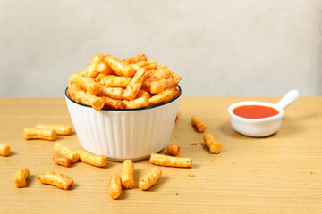 Spicy Crunchy Snacks with Dipping Sauce: A Delicious and Satisfying Treat