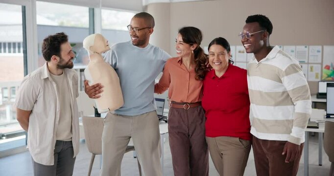 Teamwork, laughing and cpr with people in workshop for support, healthcare or solidarity. First aid training, mannequin and diversity with group in office for learning, paramedic instructor and class