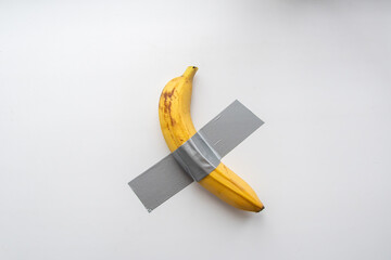 A banana taped to the wall	