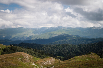 beautiful view of the mountain and clouds on a summer day from the top of the mountain